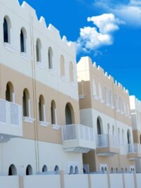 Shahama beige precast villa rows with Emirati arches